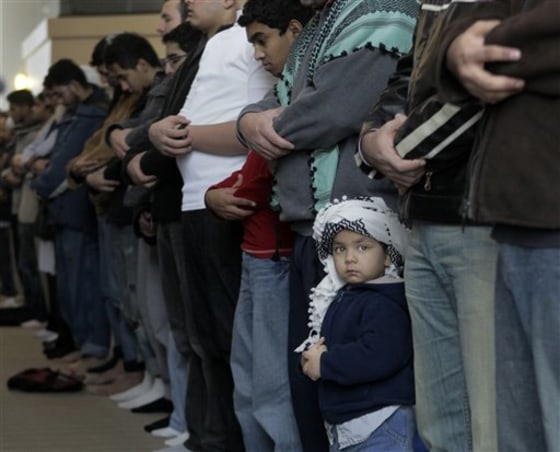 U.S. Muslims are waging a debate about how much English they can use inside mosques without violating Islamic law or losing the authenticity of their faith.